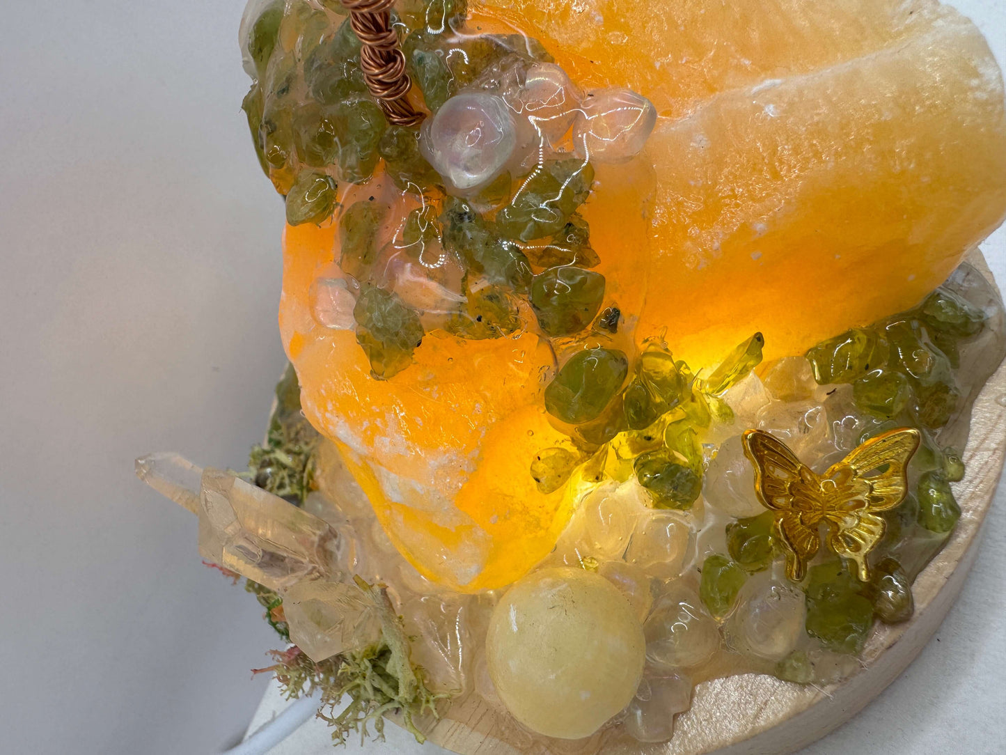 Crystal lamp featuring an illuminated crystal garden with unique designs and vibrant colors.