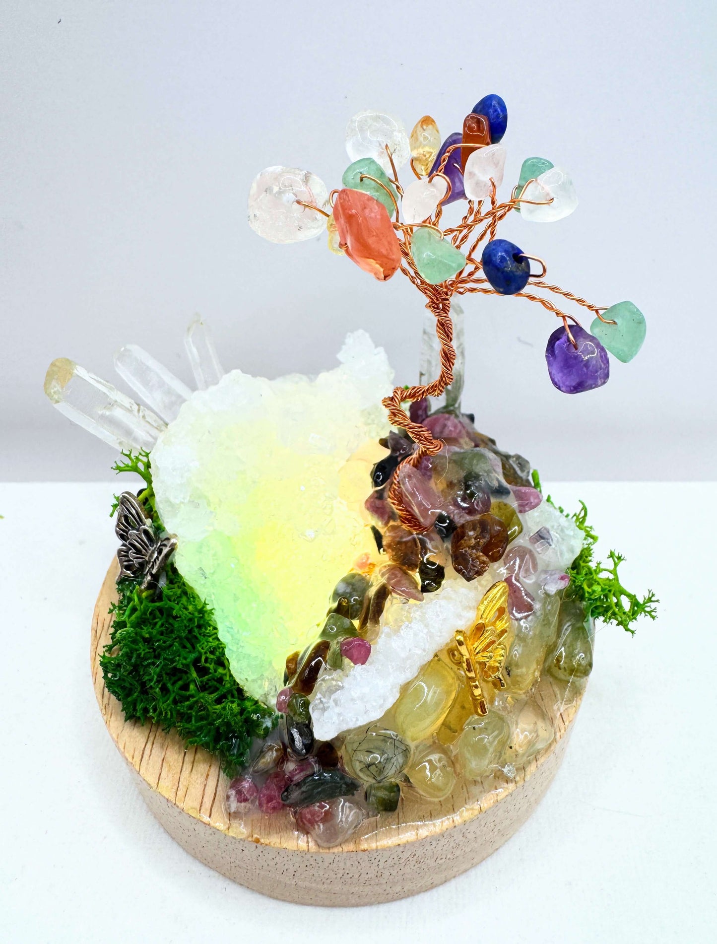 Crystal lamp featuring a handcrafted garden with crystals, moss, and a miniature glowing tree.