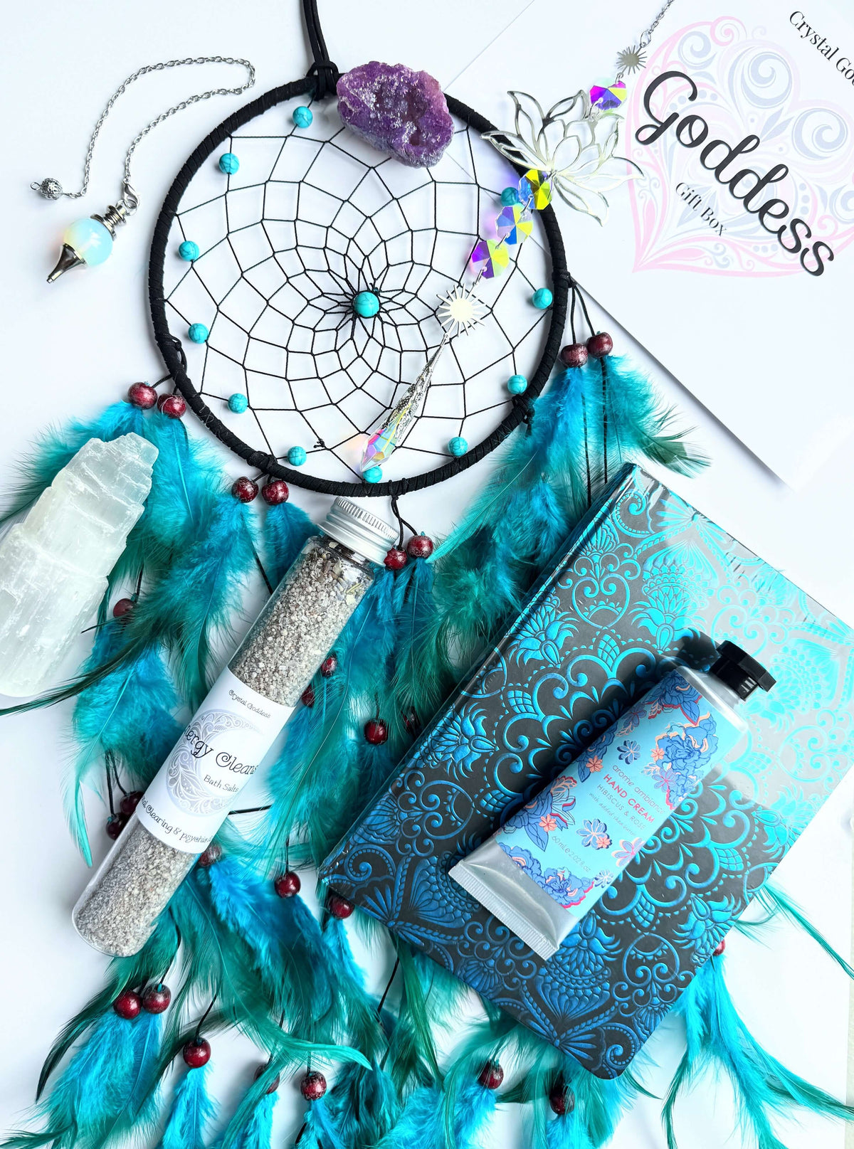 Goddess Gift Box with dreamcatcher, crystals, and self-care items for spiritual inspiration and relaxation.