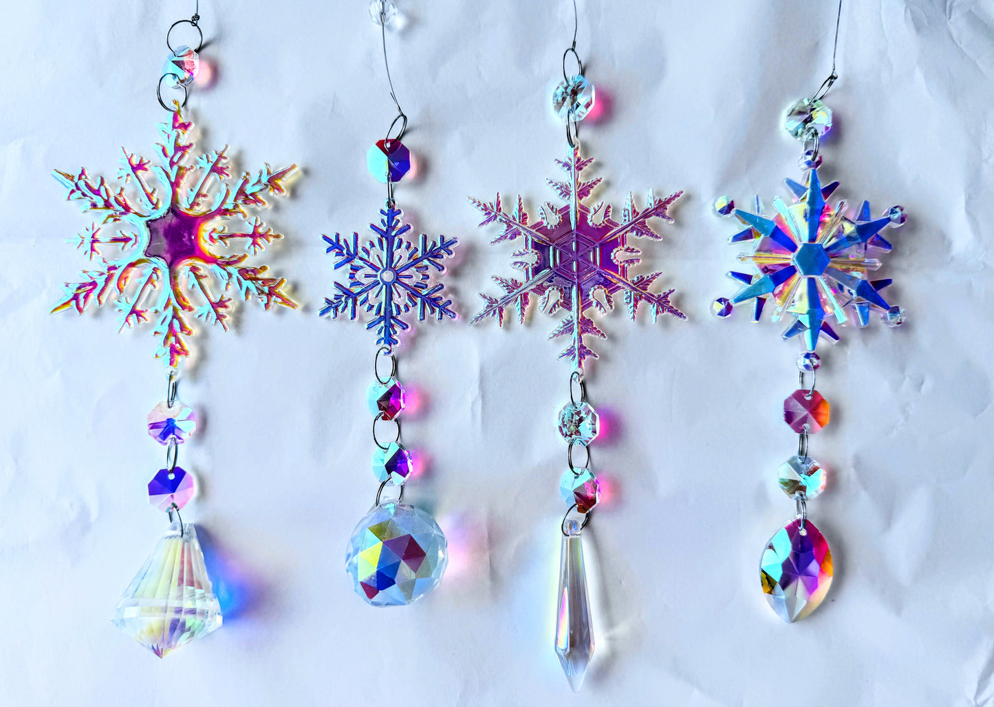 Set of Four Snowflake Sun Catchers.