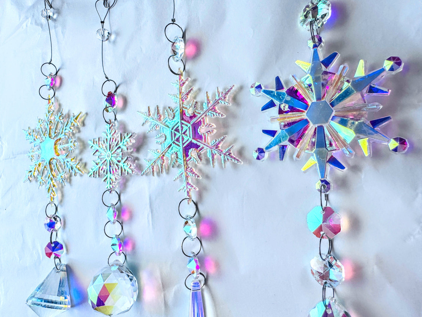 Set of Four Snowflake Sun Catchers.