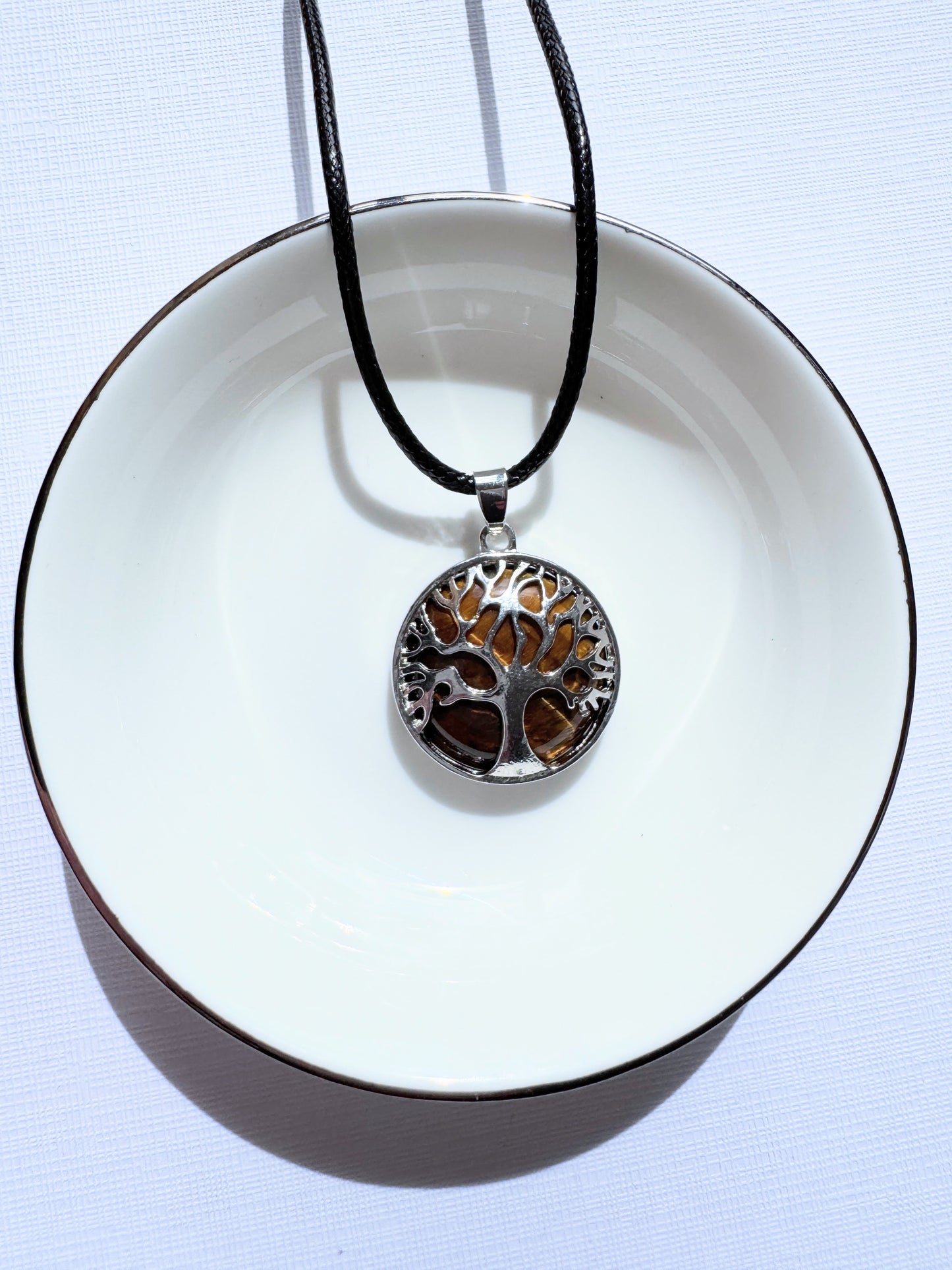 Tree of life round crystal pendants.