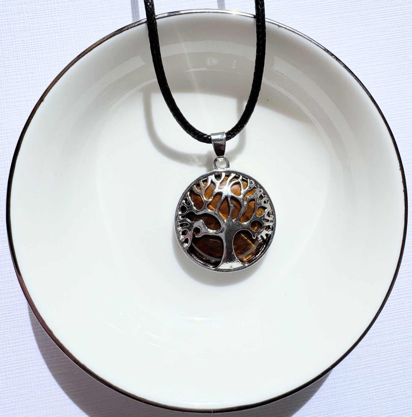 Tree of life round crystal pendants.