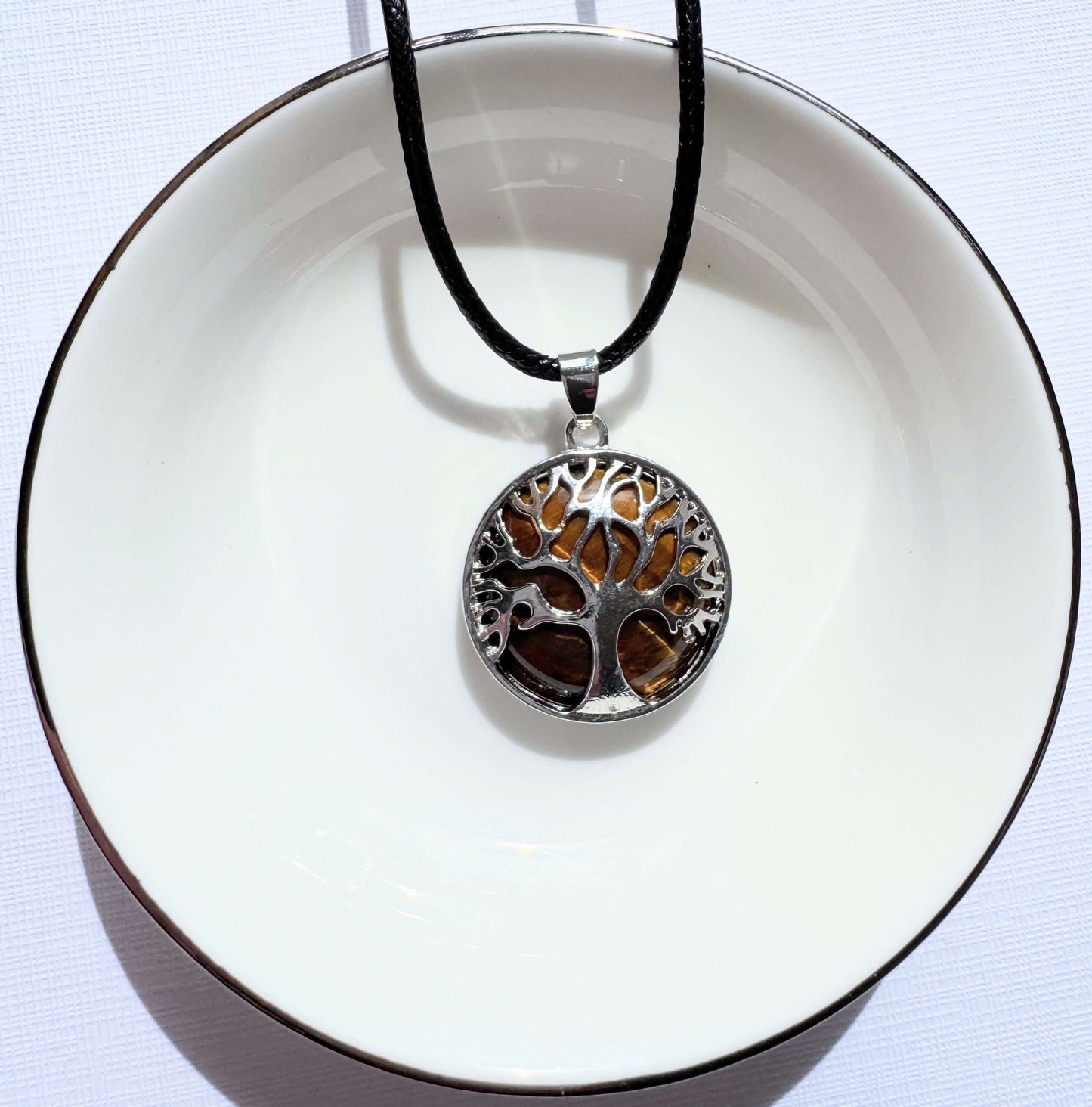 Tree of life round crystal pendants.