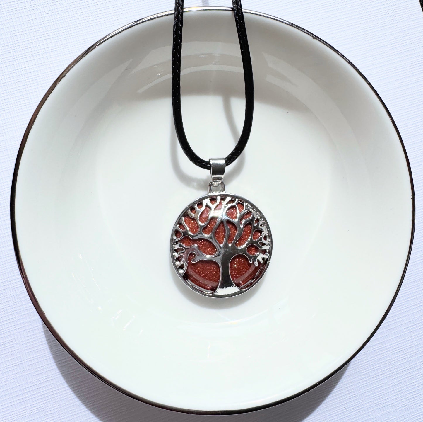 Tree of life round crystal pendants.