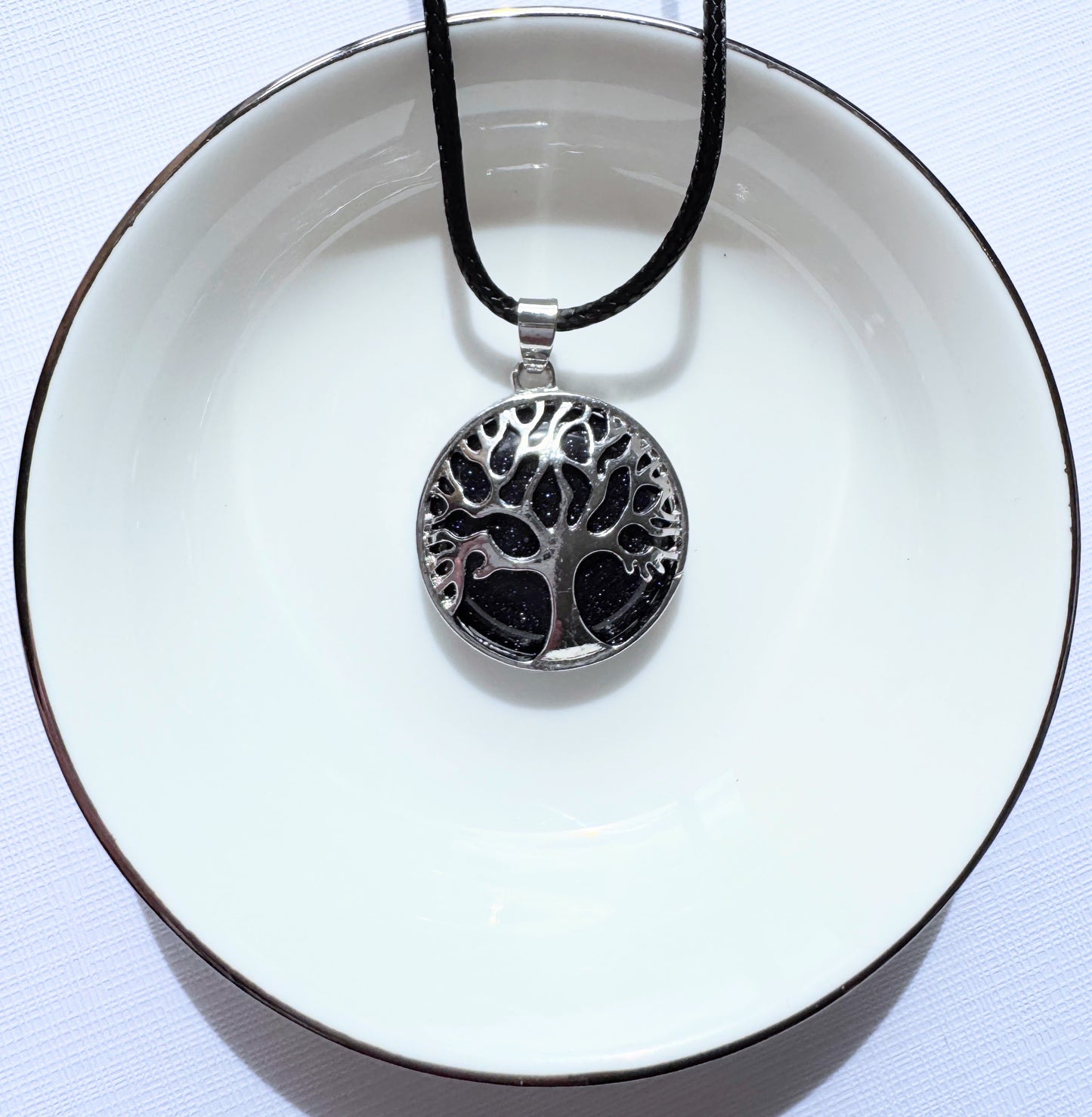 Tree of life round crystal pendants.