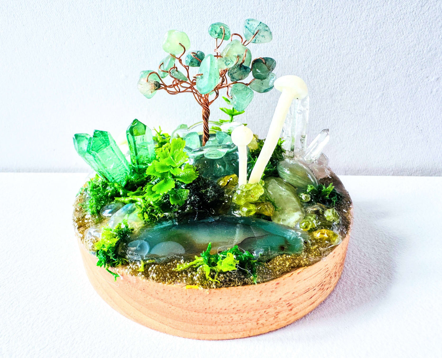 Handmade miniature garden featuring crystals and LED light, showcasing a Crystal lamp scene.