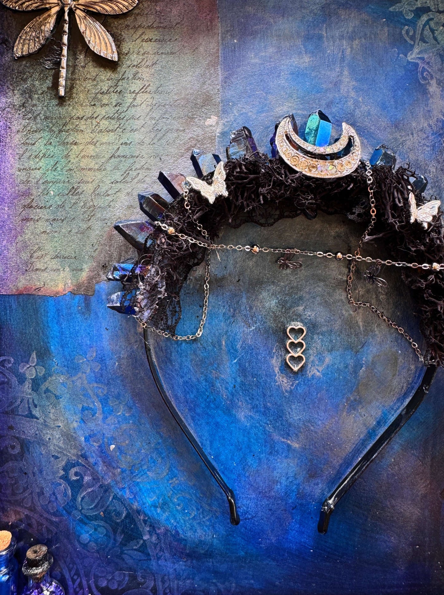 Moon Veil Crown featuring crystal art with crescent moon details and delicate chains, set against a midnight blue backdrop.