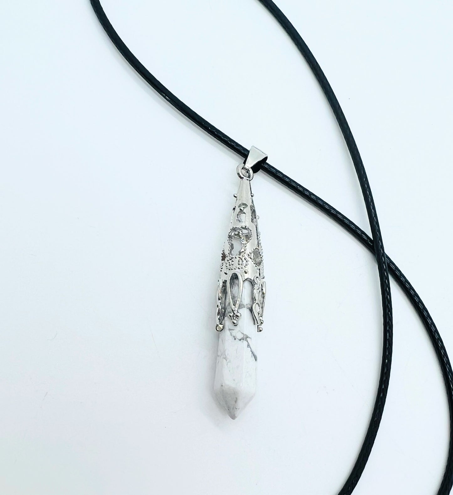 Howlite pendant on white background