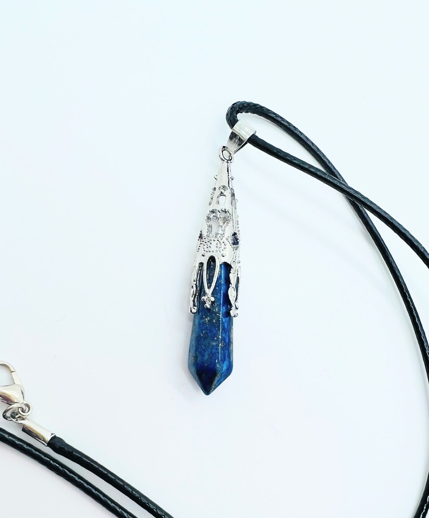 Lapis pendant on white background