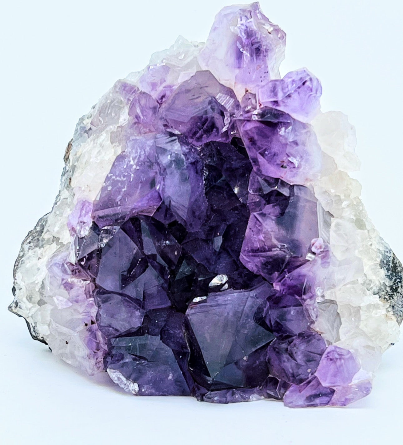 Stunning amethyst cluster from our large crystals collection. Discover more larger crystals to elevate your space.