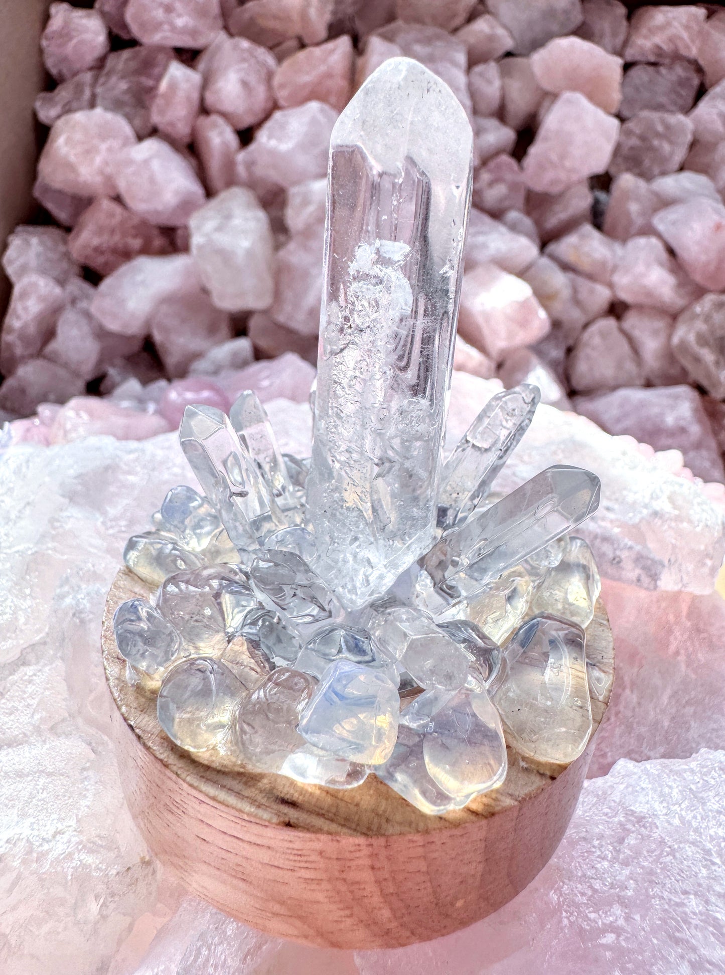 Crystal cluster lamp with clear quartz and opalite on wooden base, glowing softly with LED colors. Perfect for clarity and intuition.