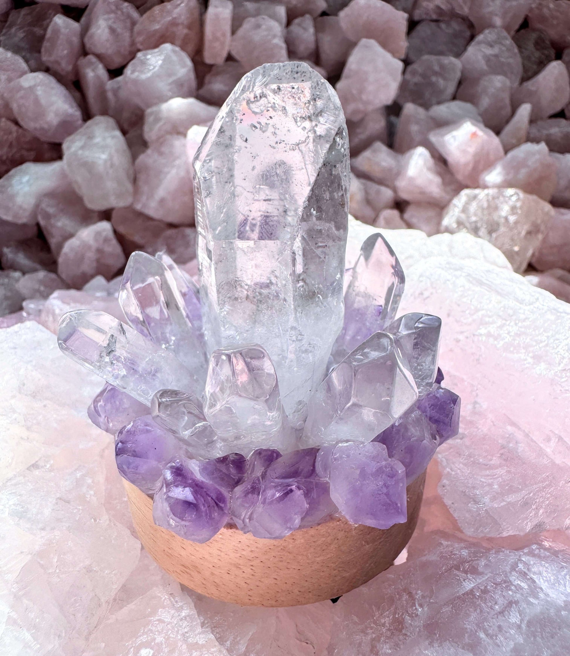 Crystal lamp with clear quartz point and amethyst cluster on wooden base with LED rainbow light