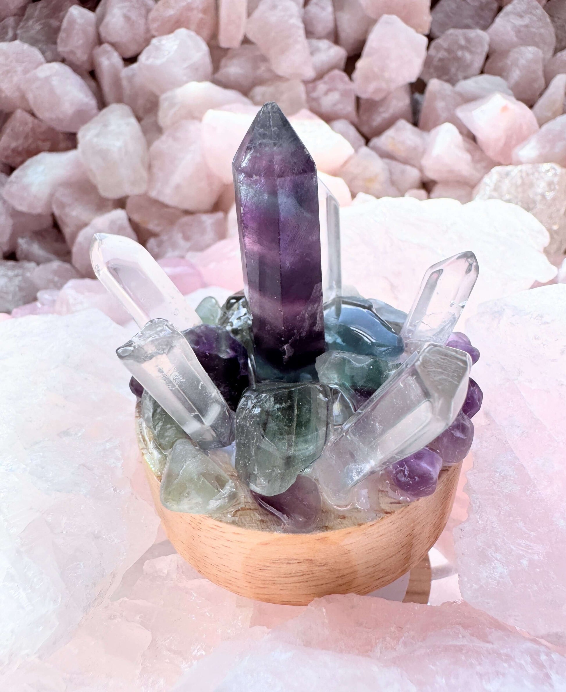 Crystal lamp with fluorite and clear quartz cluster on a wooden base, emitting cool white LED light for calming ambiance.