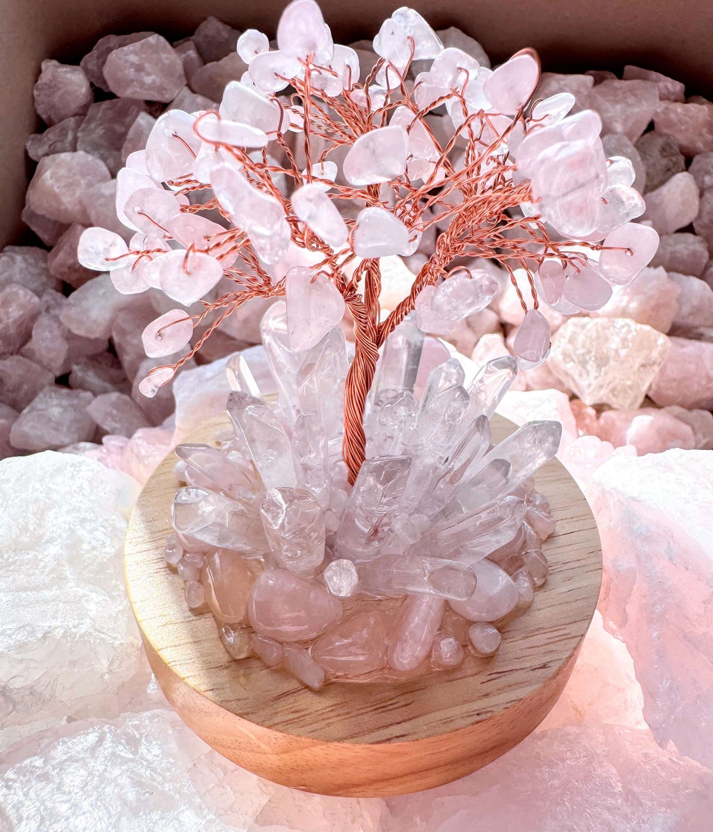 Crystal Lamp with Rose Quartz tree and Clear Quartz points on wooden base, providing soft and radiant lighting.