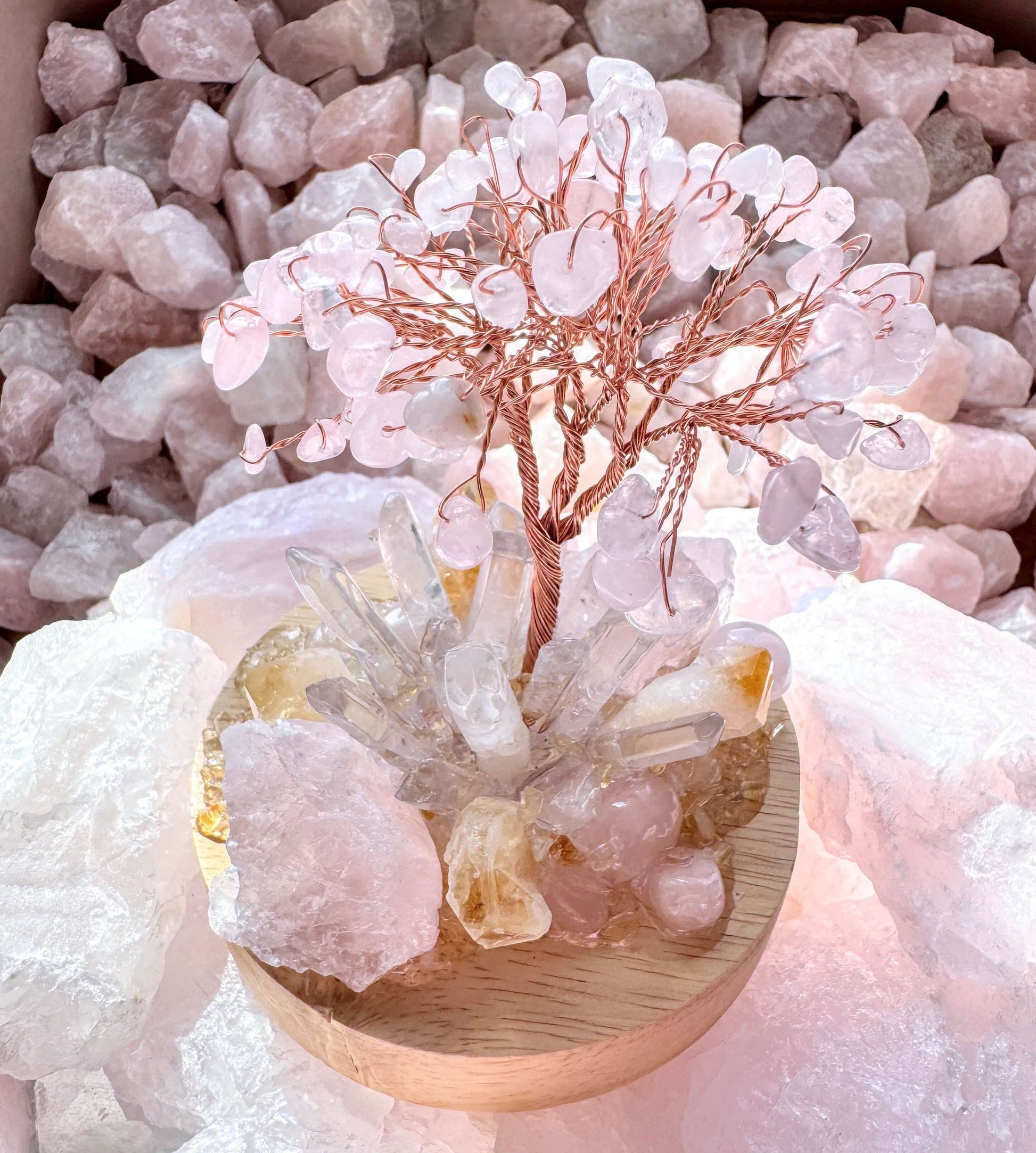 Crystal lamp featuring a rose quartz tree with citrine and clear quartz on a wooden base, 10cm, warm LED light, enhances love and abundance.