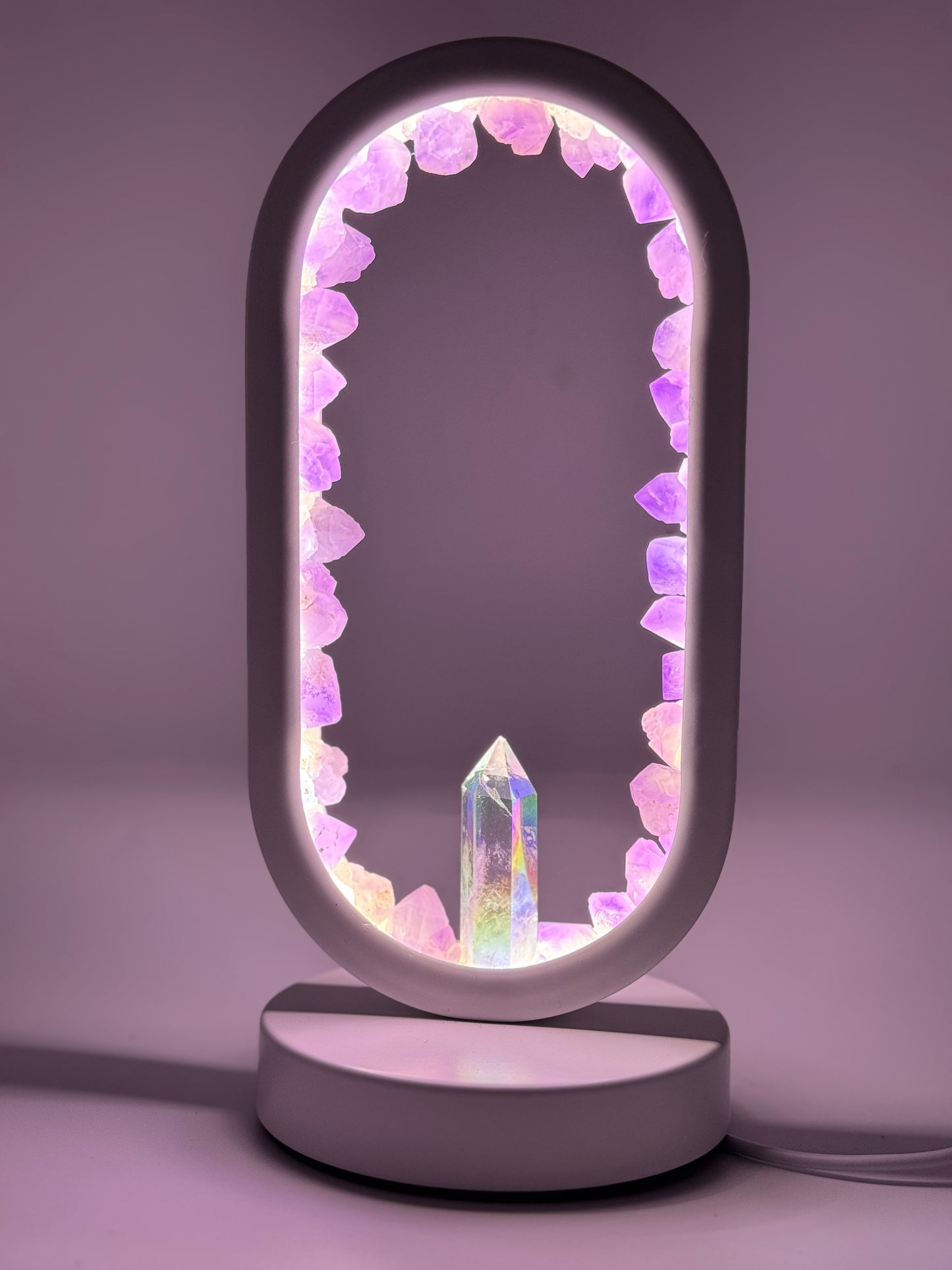 Crystal Portal Lamp with amethyst clusters and angel aura quartz glowing in lavender hues.