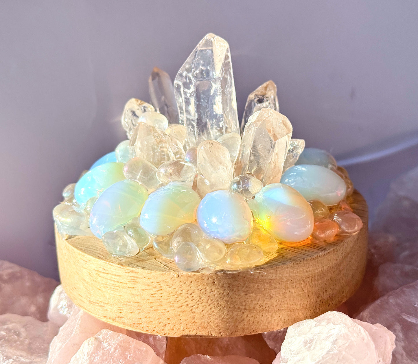 Opalite and Clear Quartz crystal cluster lamp on wooden base with glowing pastel hues; enhances clarity and intuition.