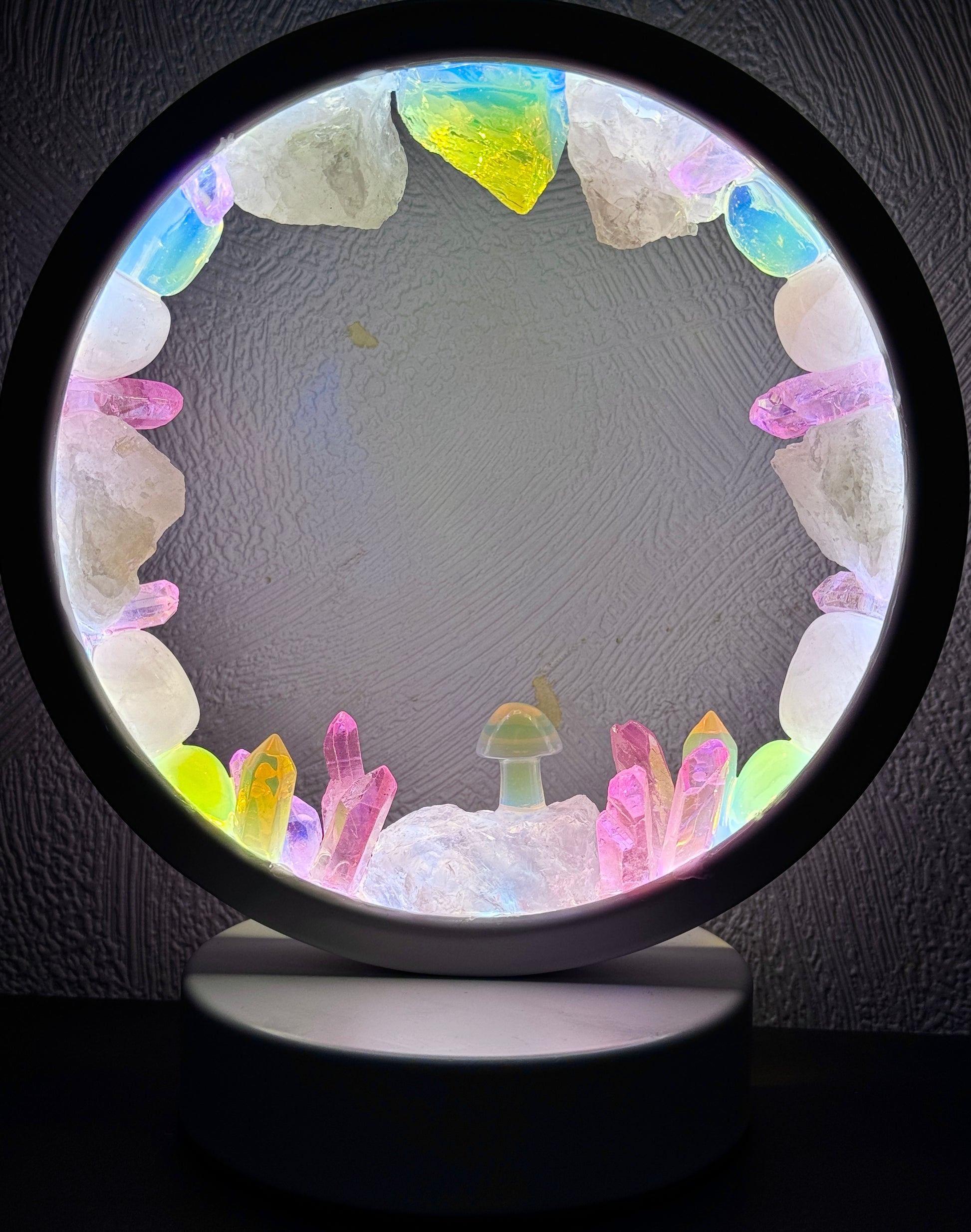 Crystal lamp opalite halo with pink aura quartz and rose quartz, 16 × 18 cm, emits a pastel glow of pinks, blues, and yellows.