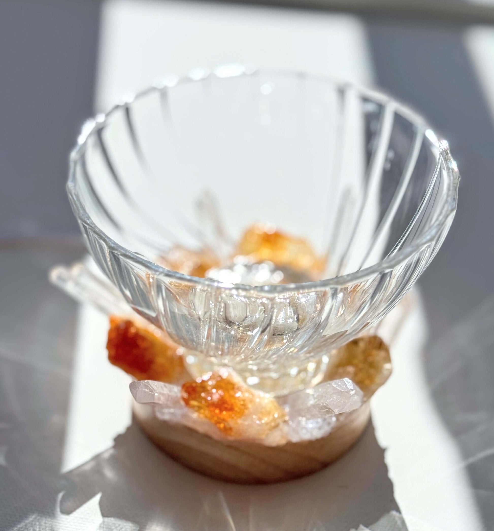 Golden Glow Crystal light bowl with textured glass on LED wooden base, accented by natural citrine and clear quartz.