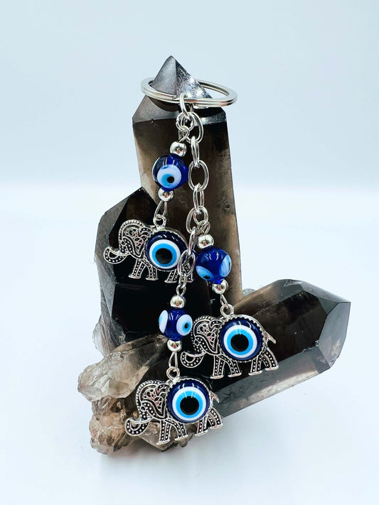 Evil Eye key ring on smoky quartz crystal. 