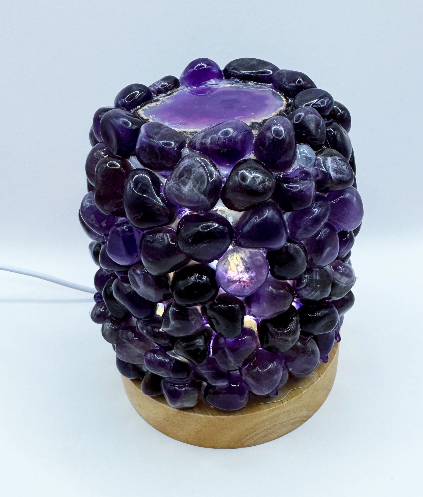 Tumbled Amethyst Dome Crystal Lamp with agate center on wooden base, 13cm height, perfect for home decor and relaxation lighting.