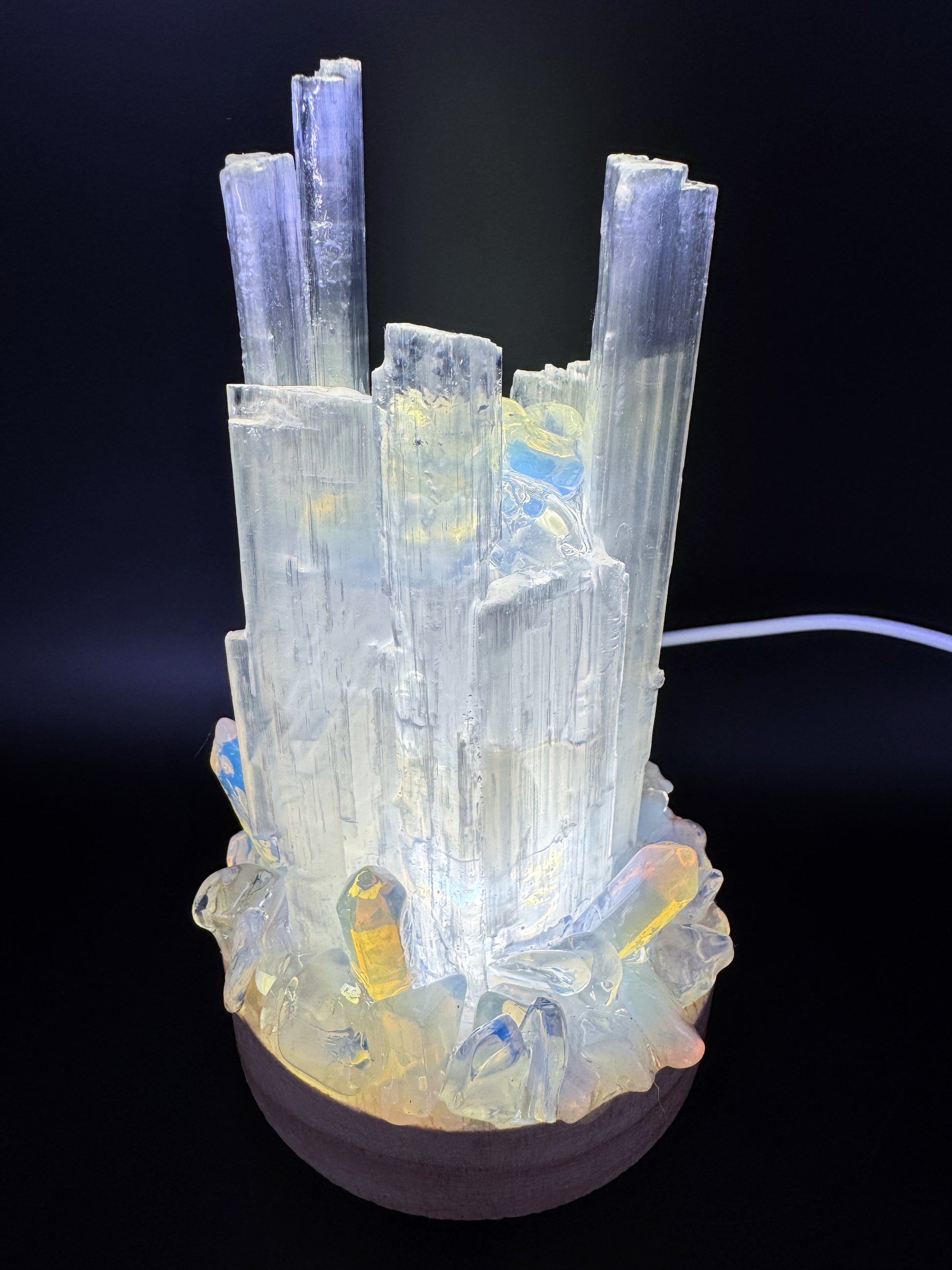 Selenite Crystal Lamp with opalite base glowing soft white light, handmade from natural selenite towers with resin-coated base.