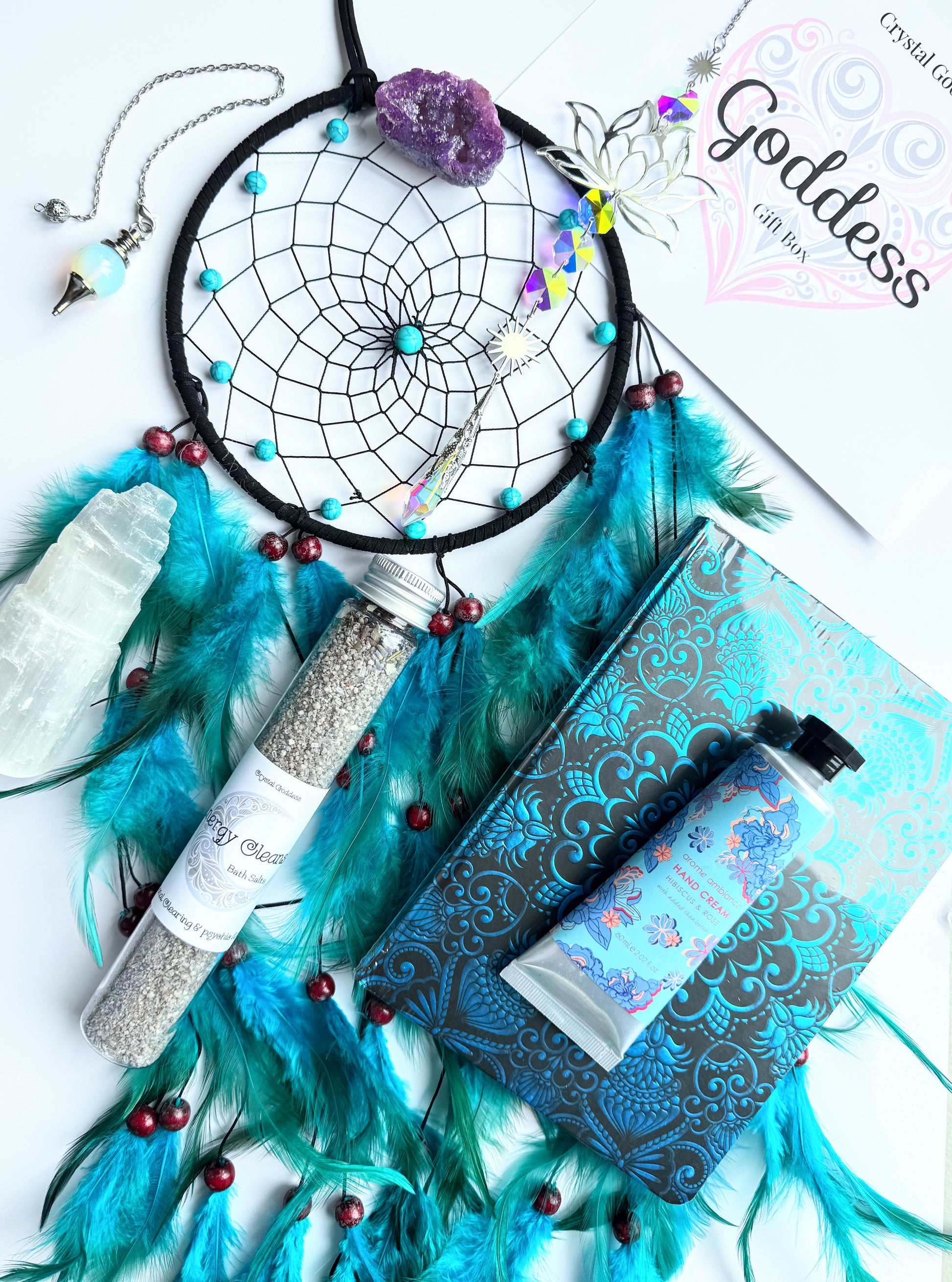 Goddess Gift Box with dreamcatcher, crystals, and self-care items for spiritual inspiration and relaxation.