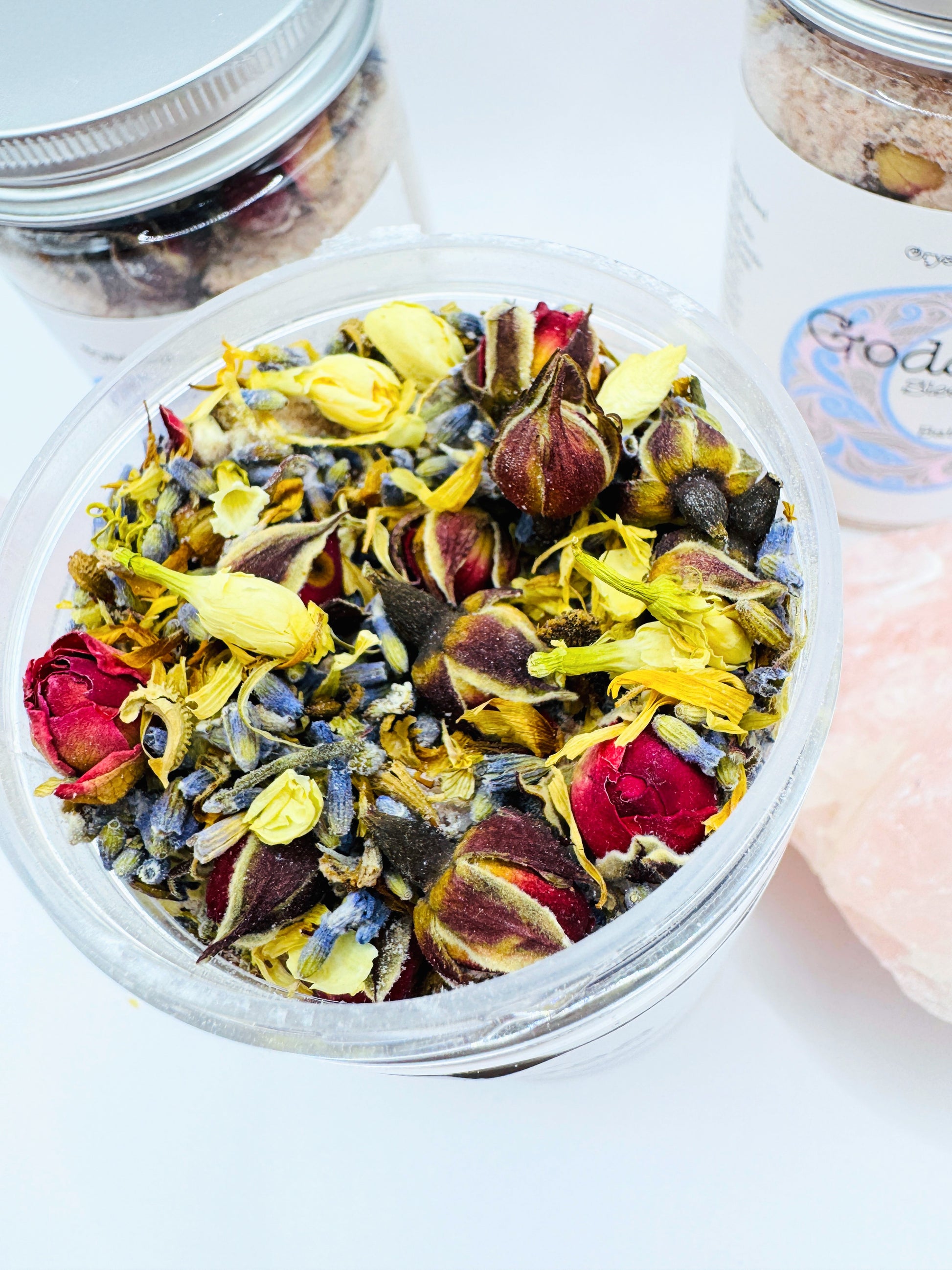 Goddess Calm & Sleep Bath Salts mixture with dried flowers, Epsom, Himalayan, and Celtic salts for relaxation.