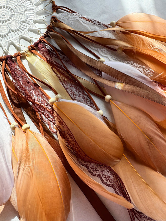 Natural Tones Flower Dream Catcher with flowing ribbons and feathers in warm earthy shades.