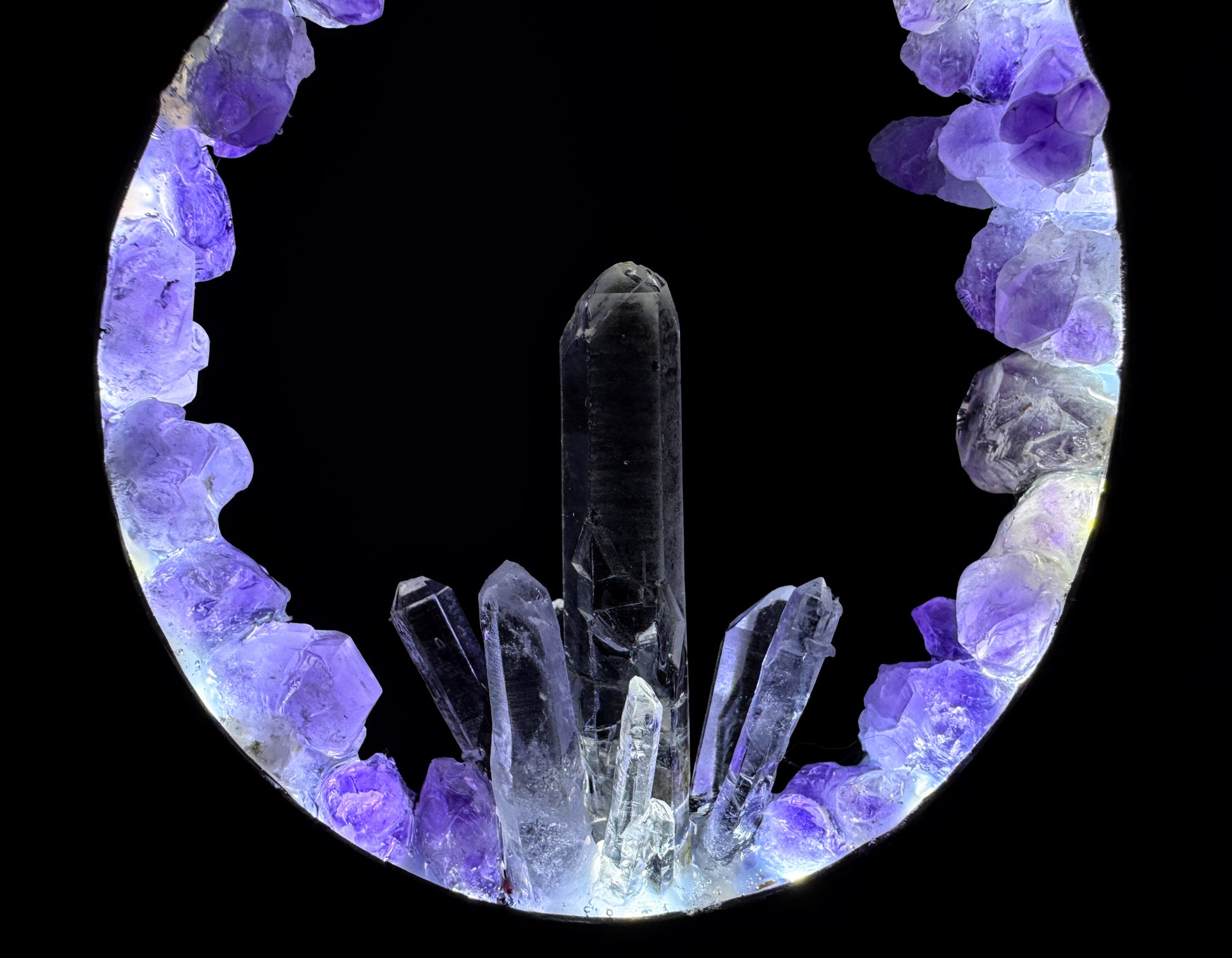 Amethyst & Clear Quartz Crystal Lamp showcasing luminous flame design, featuring amethyst and clear quartz crystals.