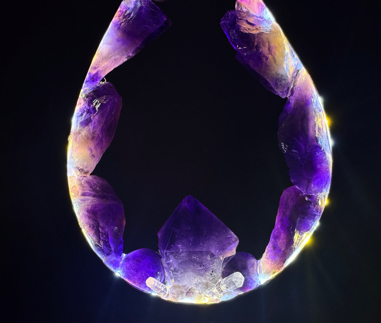Flame crystal lamp displaying raw amethyst with natural points in a flame-style design, showcasing deep earthy colors.