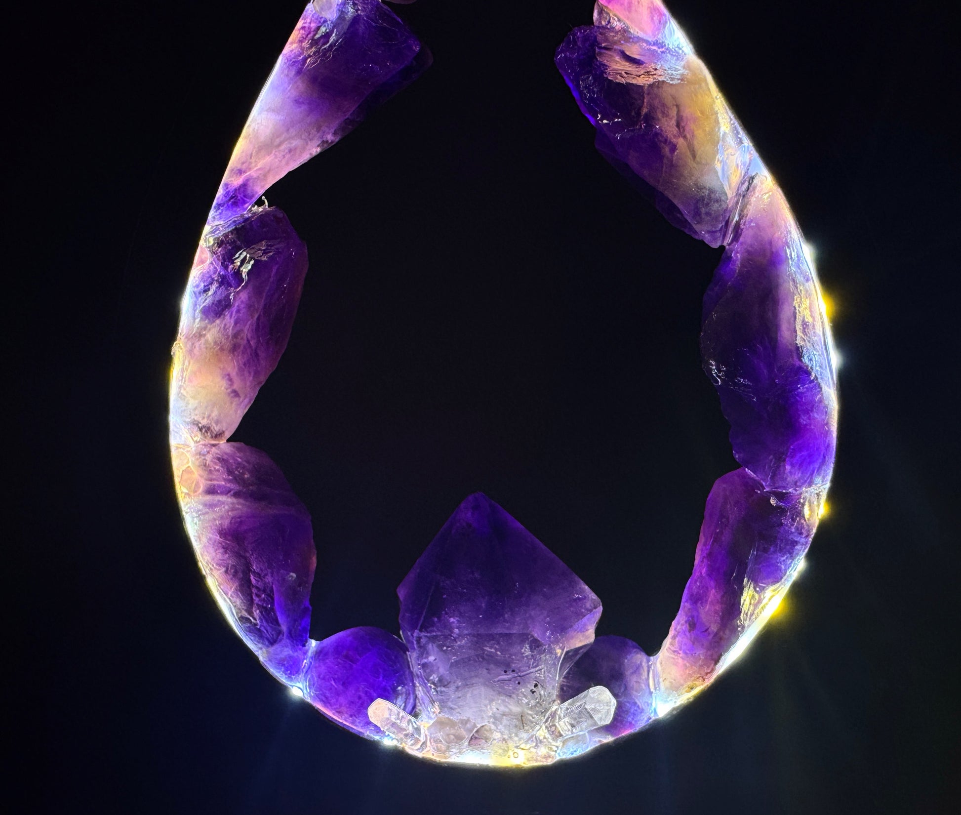 Flame crystal lamp displaying raw amethyst with natural points in a flame-style design, showcasing deep earthy colors.