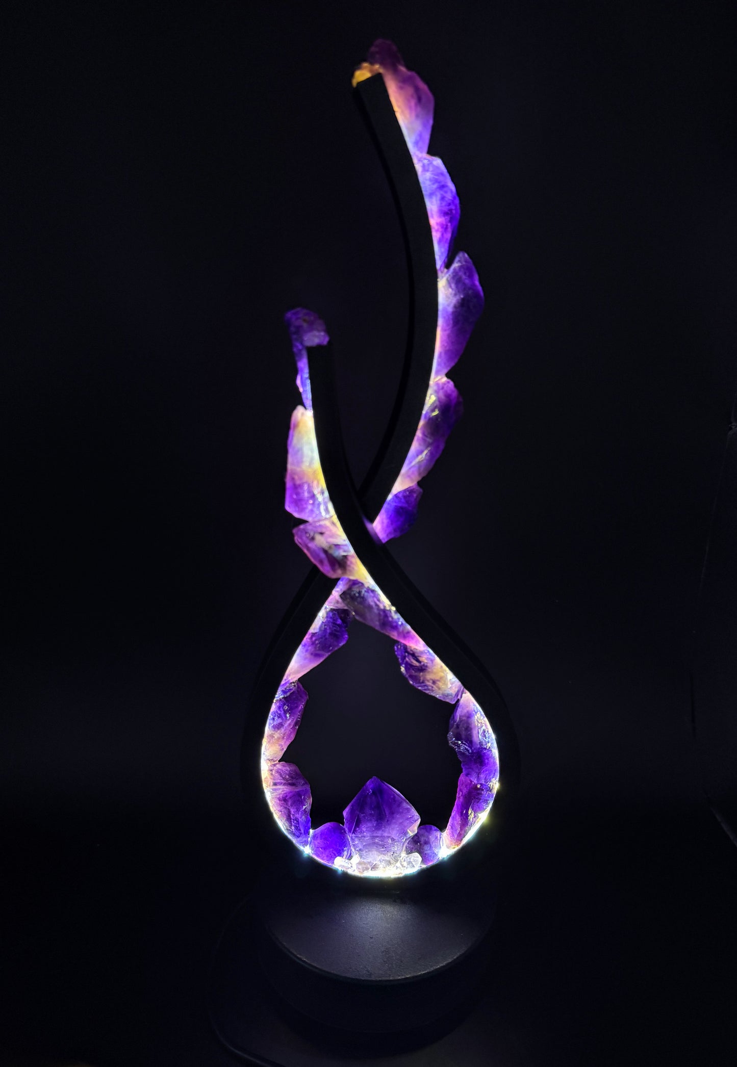 Flame crystal lamp "Eternal Flame" featuring raw amethyst and a unique flame-style design.