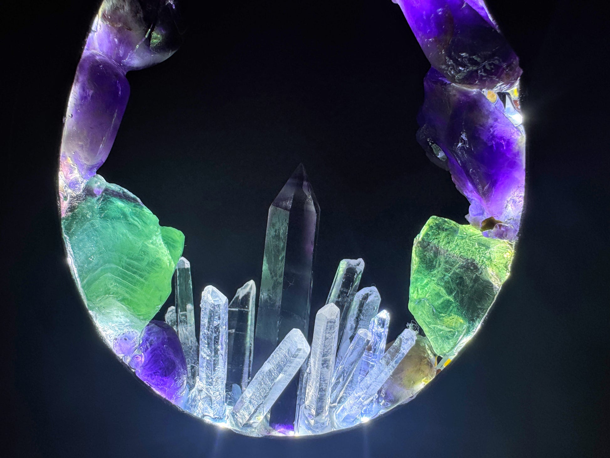 Amethyst & Fluorite Crystal Lamp showcasing vibrant colors and clear quartz points, highlighting the flame-style design.