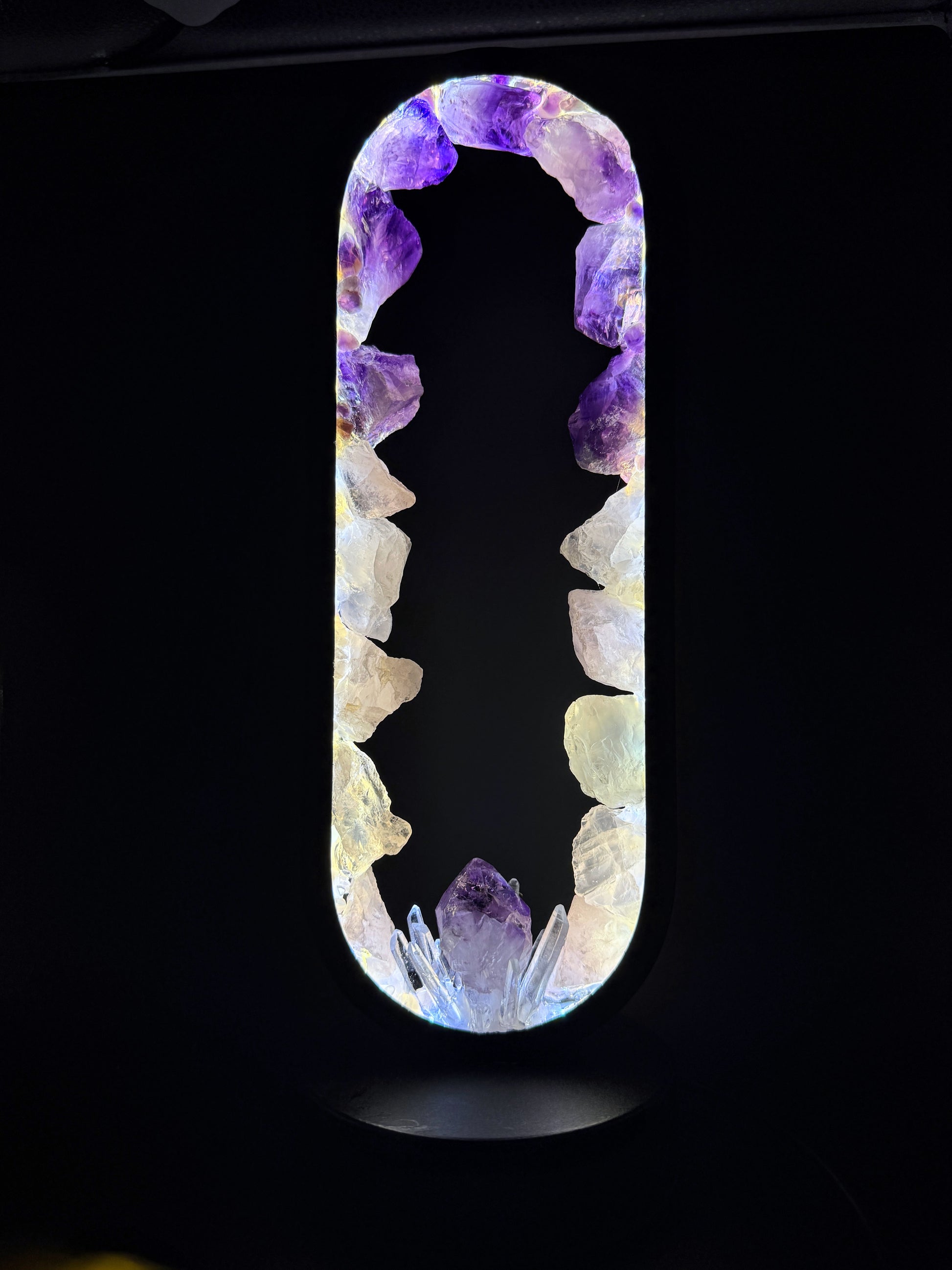 Crystal Portal Lamp “Rose Aura” featuring amethyst and rose quartz crystals, creating a calming light display.