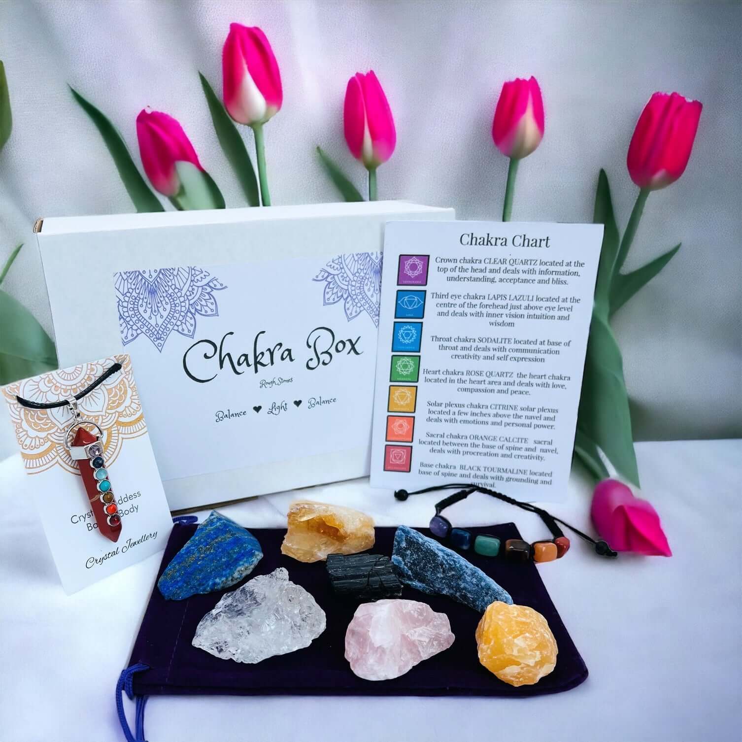 Chakra gift box containing chakra stones, chakra bracelet and chakra pendant