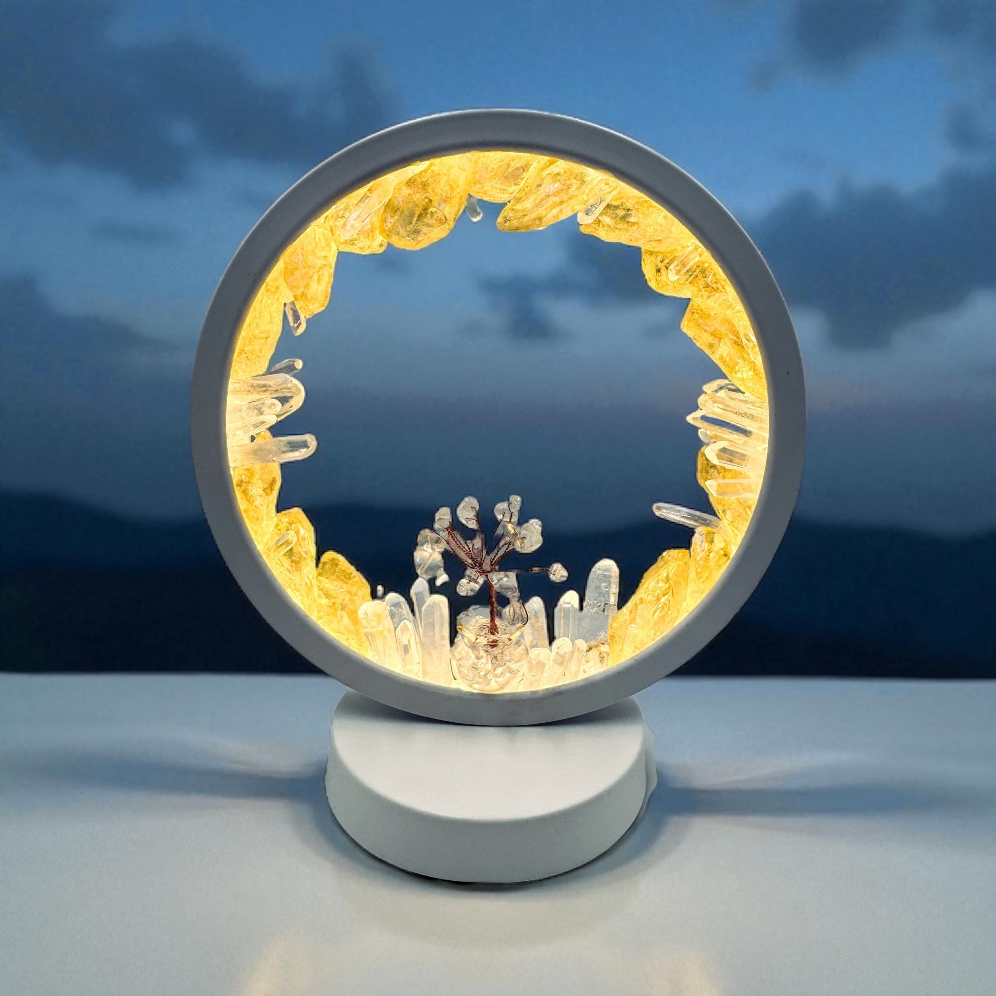 Crystal lamp "Aura Sun Fire" with yellow aura quartz and clear quartz, featuring a central clear quartz crystal tree for warm, magical glow.