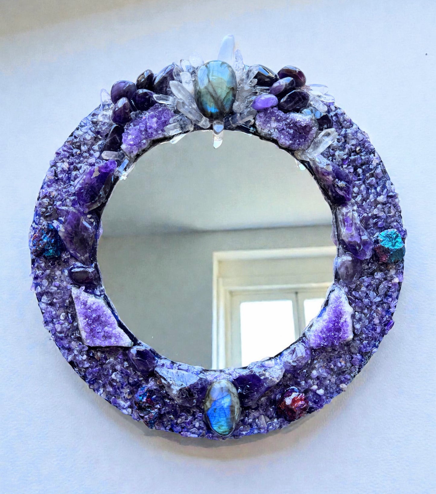 Crystal Mirror “Lunar Spirit” with labradorite, amethyst, clear quartz, and peacock pyrite, 28cm frame, 18cm mirror.