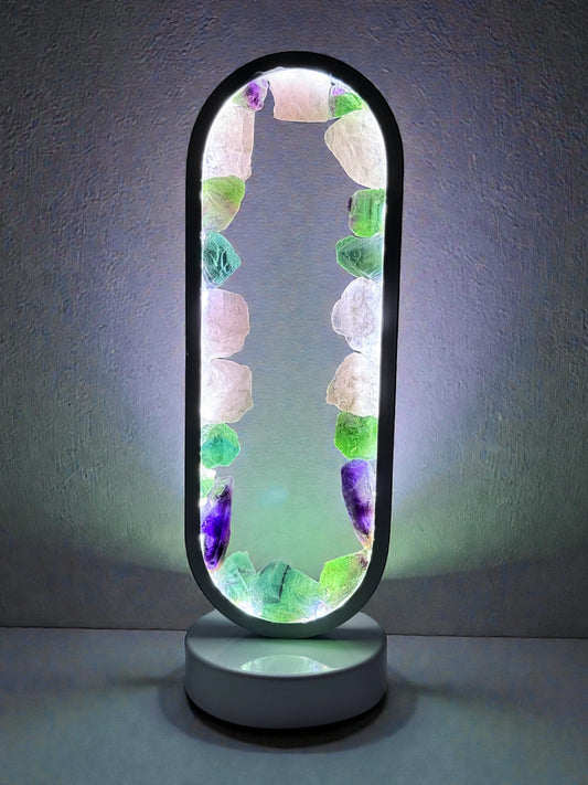 Crystal Portal Lamp "Heaven's Garden" with rose quartz and fluorite, glowing in pastel greens, purples, and pinks.