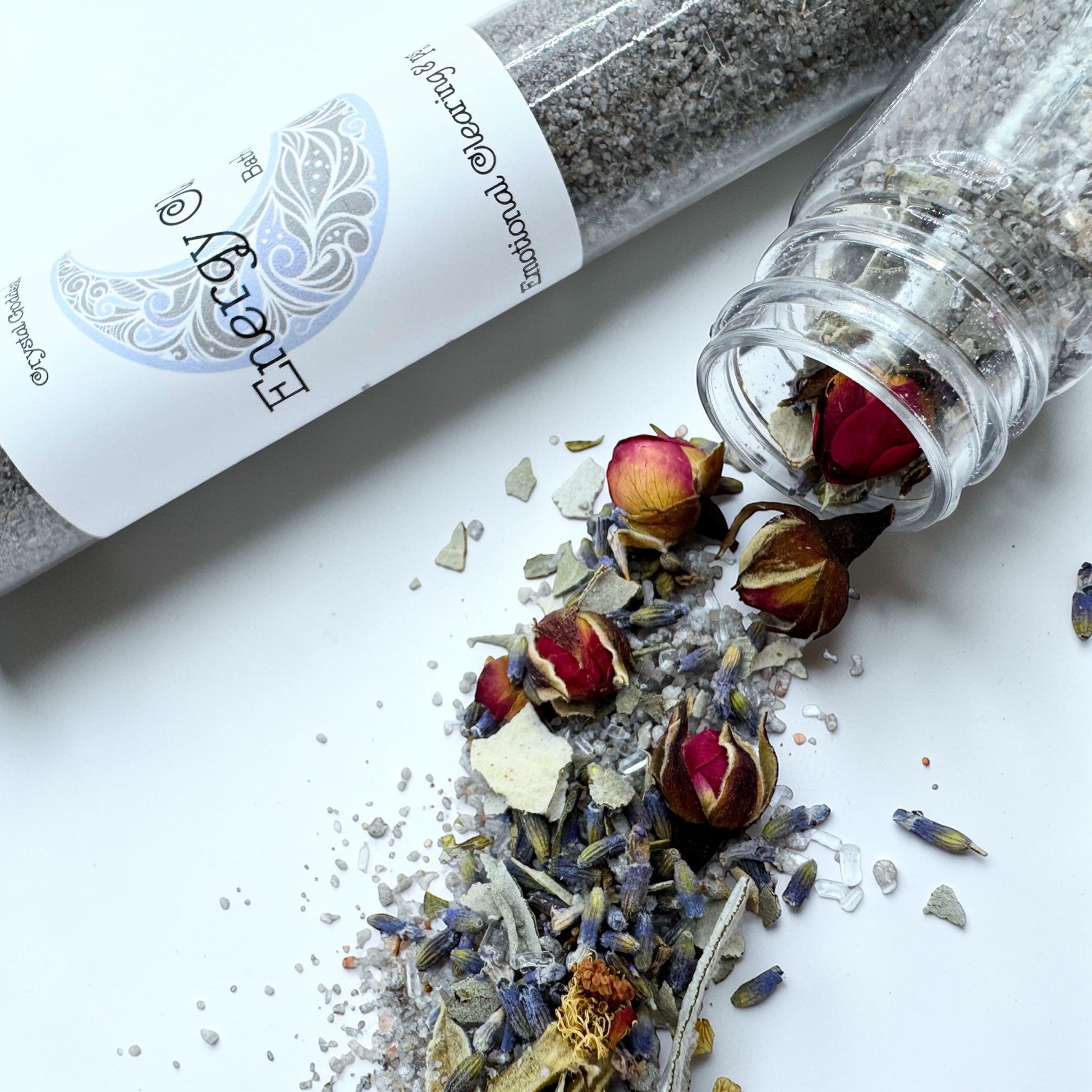 Energy Cleanse bath salts with Epsom, Himalayan, and Celtic sea salt blend, 100g bottle with dried flowers for energetic clearing.