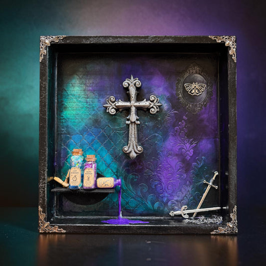 Handcrafted mixed-media shadow box featuring a gothic cross, potion bottles, and ceremonial swords in rich colors.