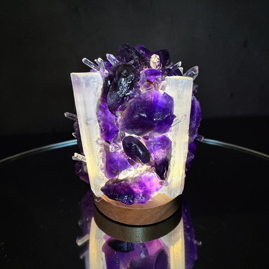 Amethyst/Selenite Dome Lamp showcasing natural crystals illuminated from within, adding a warm glow to any space.