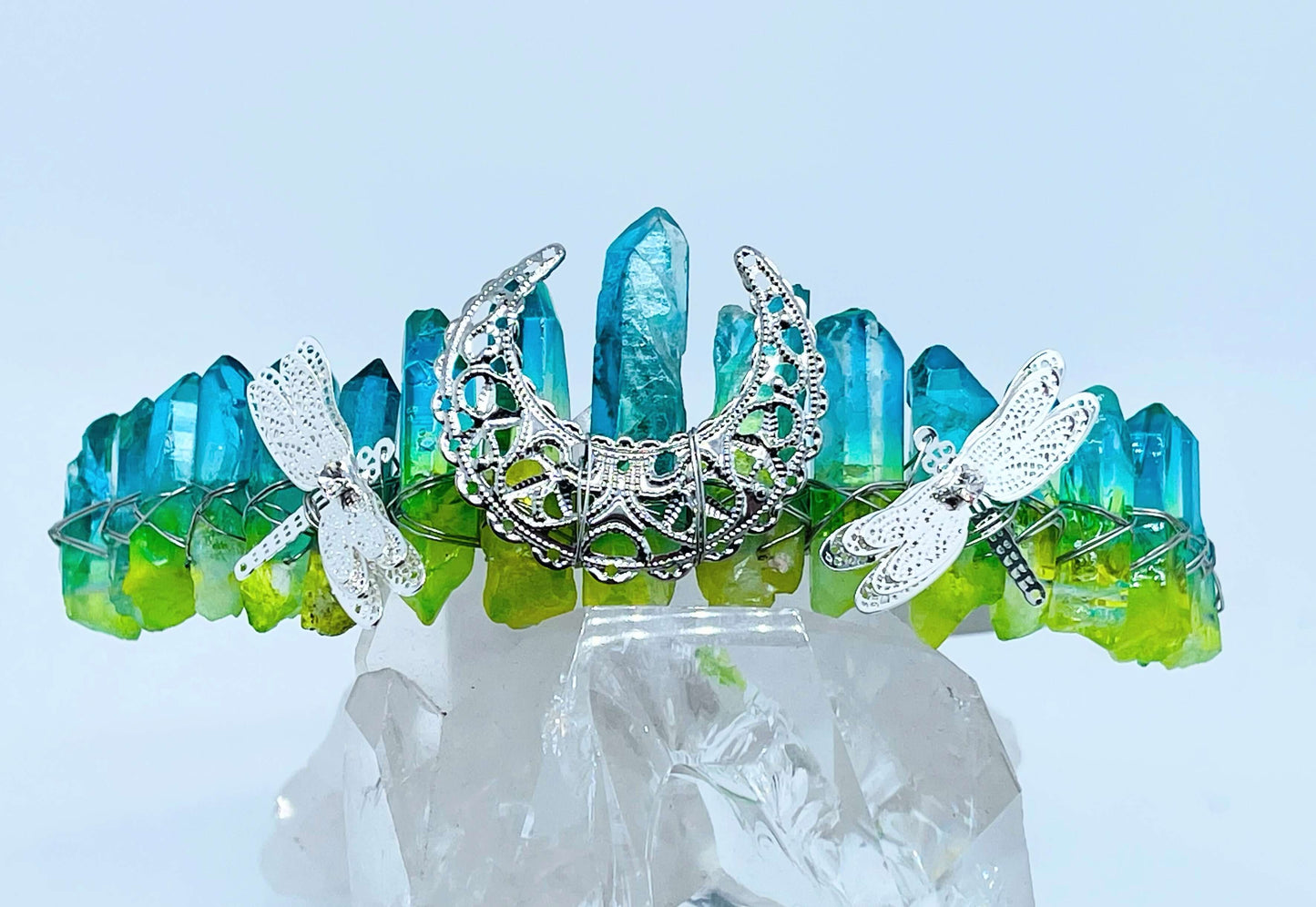 Blue and green quartz Crystal Crown with dragonfly’s on white background