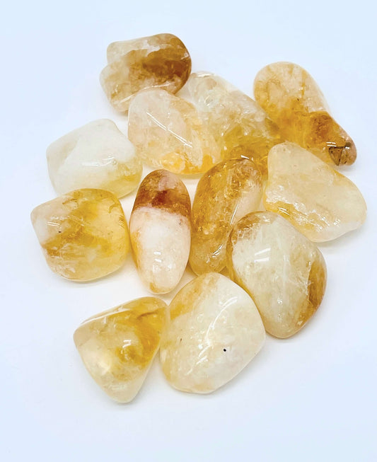 Several pieces of citrine on white background