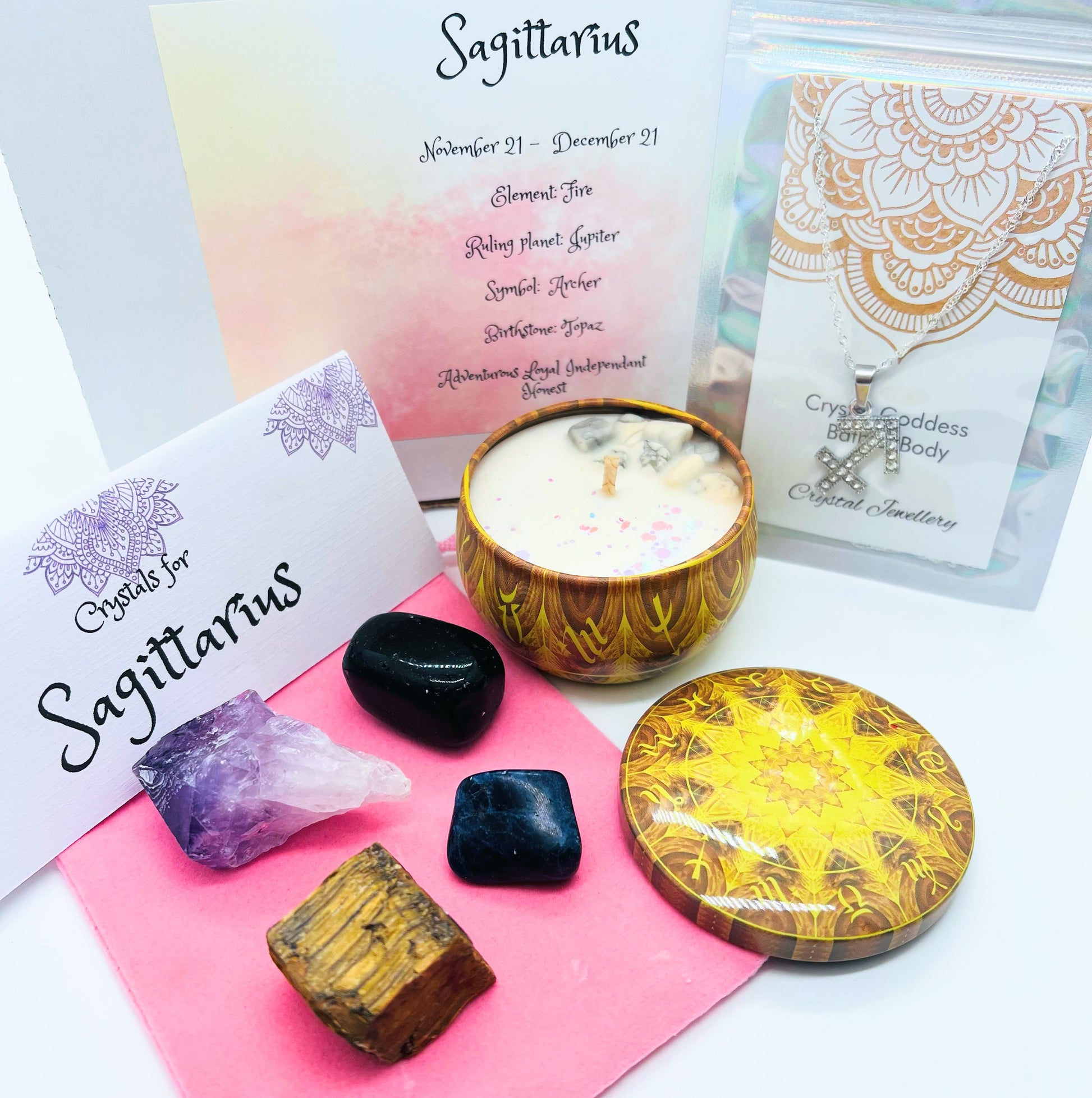 Sagittarius Zodiac gift box showing crystals for this sign and pendant necklace and crystal set.