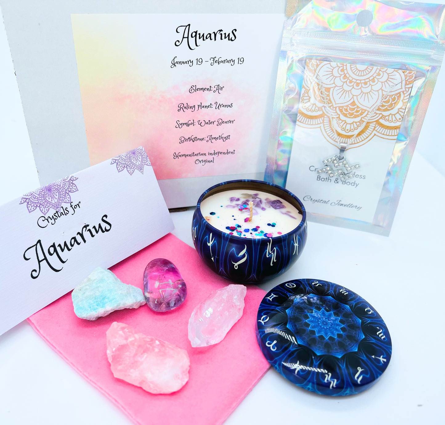Aquarius Zodiac gift box showing crystals for this sign and pendant necklace and crystal set.