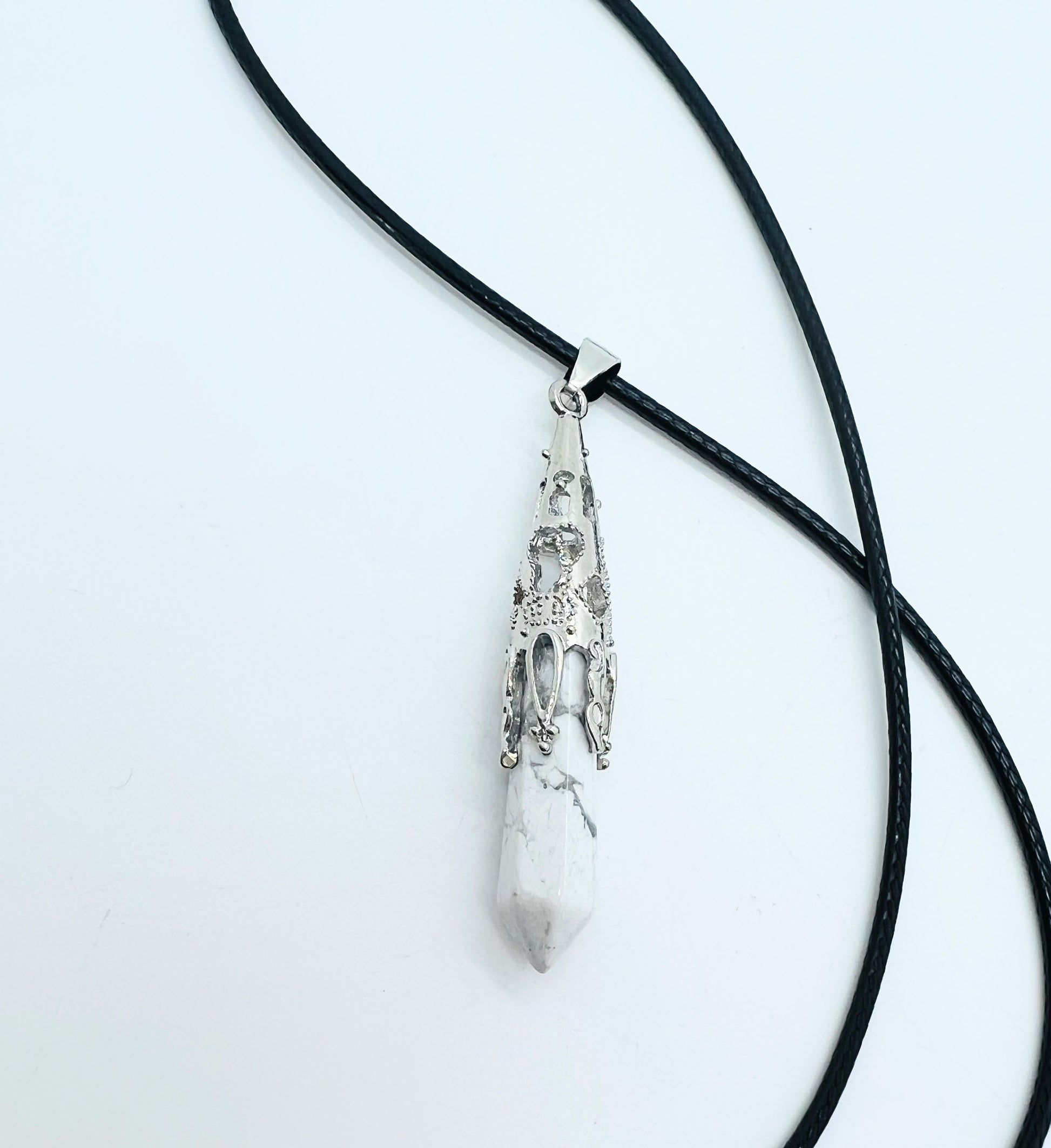 Howlite pendant on white background