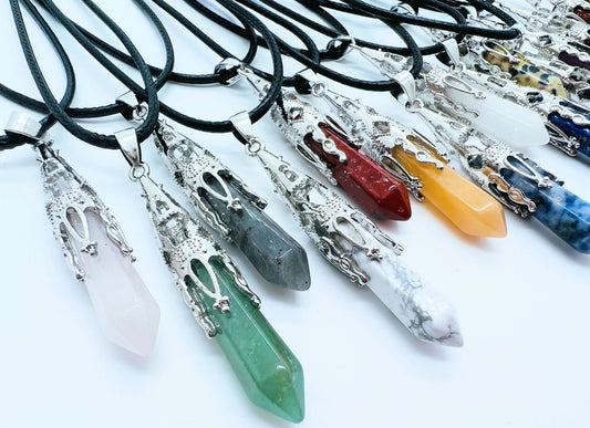 Crystal Filigree Crystal Pendants on white surface. 
